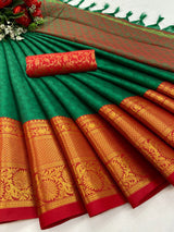 The Aura Cotton Silk saree features a broad contrast jacquard work border